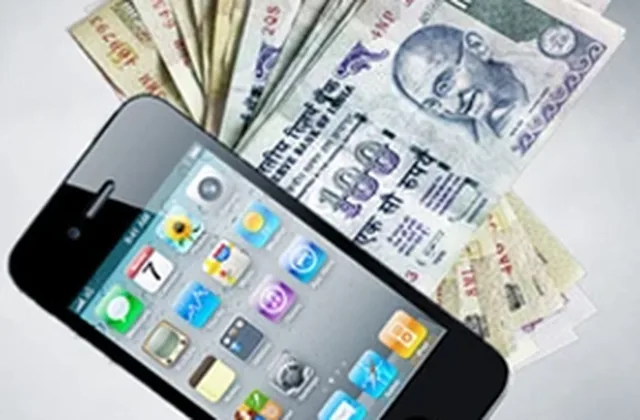 A mobile phone alongside Indian currency notes